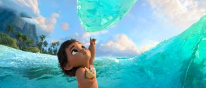 Young Moana interacting with the Ocean.